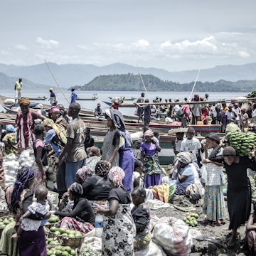 Vendors and shoppers at Kituku market on the shores of Lake Kivu in Goma, eastern Democratic Republic of Congo, April 2, 2020. Many Congolese survive on their daily earnings and cannot afford to follow health advisories on maintaining social distance.