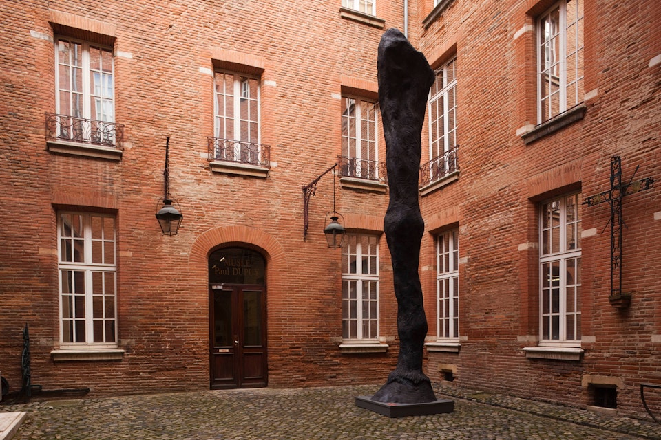 Musee Paul Dupuy museum, exterior and sculpture, Leg of a Horse by Daniel Coulet