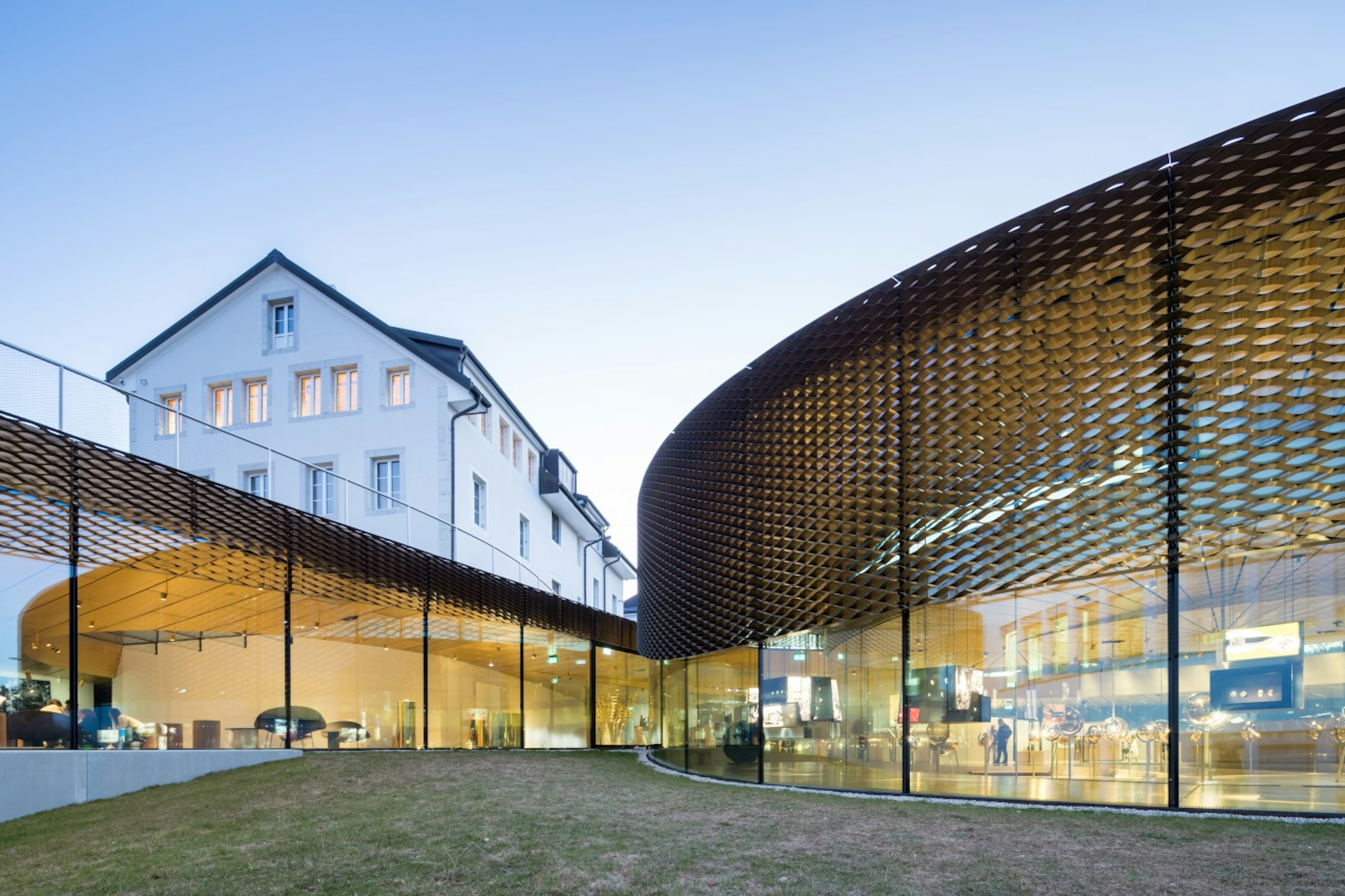 The glazed windows of the Musée Atelier Audemars Piguet in Switzerland