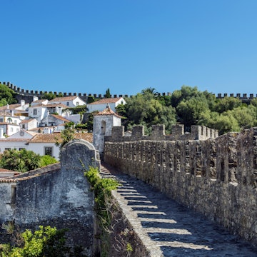 Stone walkway and Obidos cityscape, Leiria, Portugal