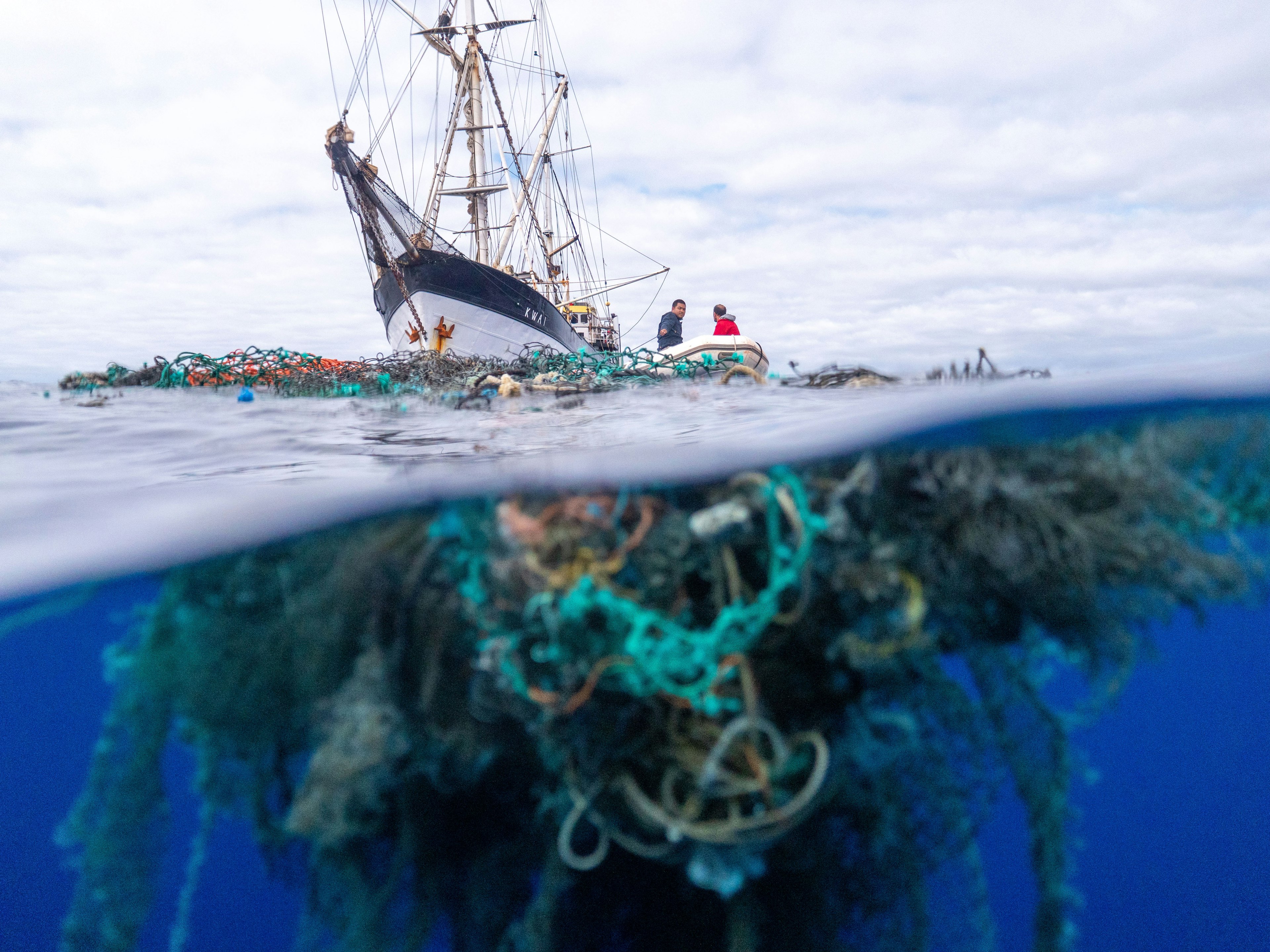 Ocean Voyages Institute net in front of ship.jpg