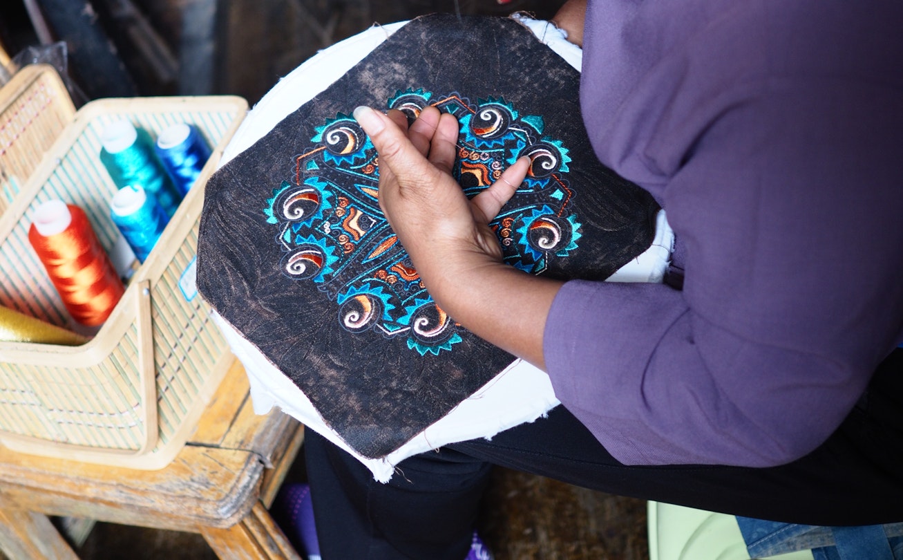Colorful embroidery is one way the Miao preserve and express their culture
