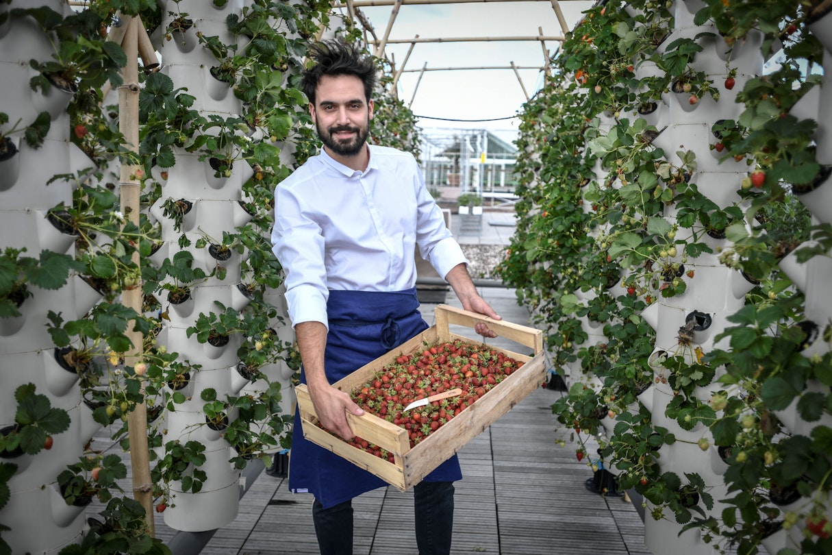 French chef of the Perchoir restaurant, Jeremy Claudepierre poses on June 15, 2020 at the biggest urban farm in Europe installed on a roof top at the Porte de Versailles exhibition center in Paris. (Photo by STEPHANE DE SAKUTIN / AFP) (Photo by STEPHANE DE SAKUTIN/AFP via Getty Images)