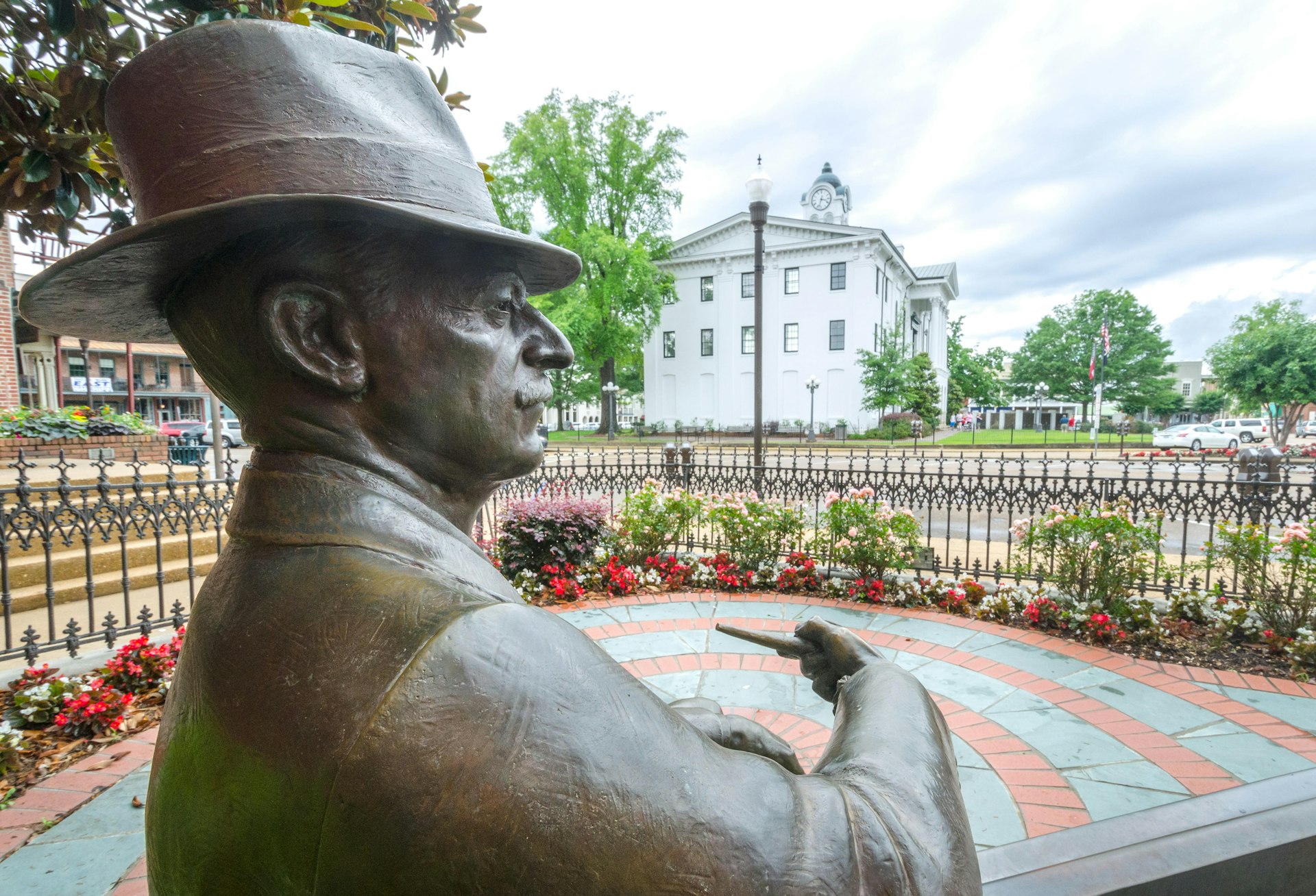 A bronze statue of William Faulkner looks out over Courthouse Square, May 31, 2015, in Oxford, Mississippi.