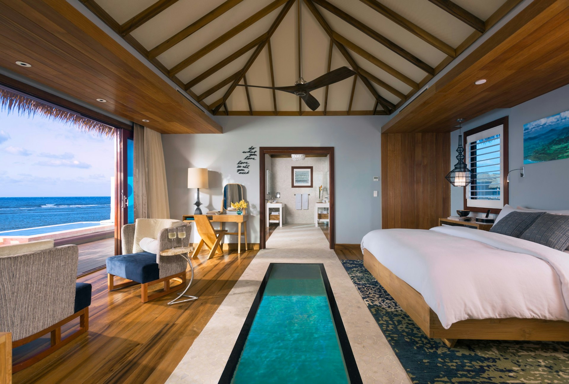 A bedroom at Sandals Royal Caribbean Overwater Villa