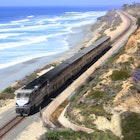 The Pacific Surfliner travels along the coastline in Del Mar, California. The Pacific Surfliner offers a unique vantage on the Southern California seascape connecting San Luis Obispo and San Diego through Los Angeles and Santa Barbara.