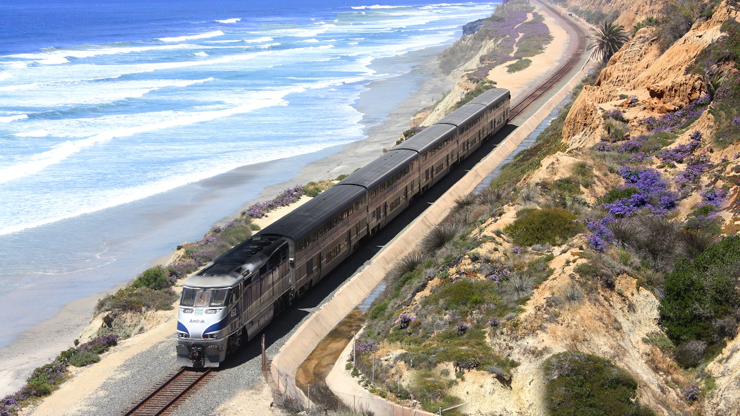 The Pacific Surfliner travels along the coastline in Del Mar, California. The Pacific Surfliner offers a unique vantage on the Southern California seascape connecting San Luis Obispo and San Diego through Los Angeles and Santa Barbara.