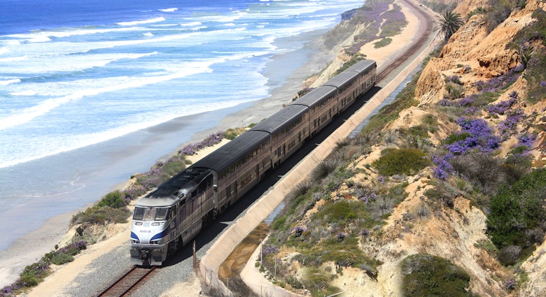 The Pacific Surfliner travels along the coastline in Del Mar, California. The Pacific Surfliner offers a unique vantage on the Southern California seascape connecting San Luis Obispo and San Diego through Los Angeles and Santa Barbara.
