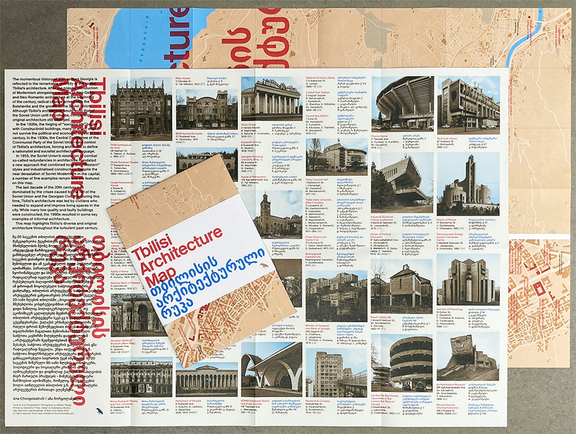 A photograph of the Tbilisi Architecture Map, with text and photographs of buildings