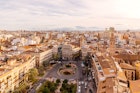 Aerial view of Valencia cityscape and Placa de la Reina square, Spain