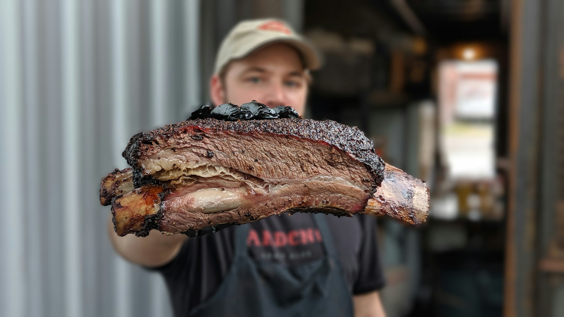 A closeup of a beef rib from ZZQ Texas Craft Barbeque