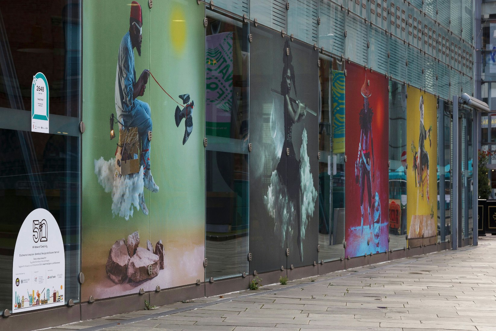 Artworks by Benji Reid in a shop window in Manchester