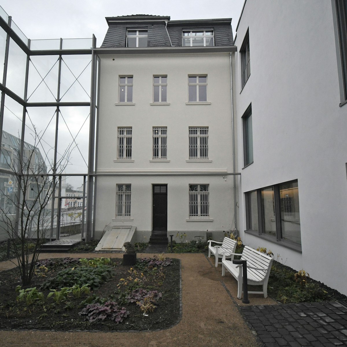 The garden of the August Macke Haus is seperated from the street via a glass wall in Bonn, Germany, 30 November 2017. The former residence and studio of painter August Macke reopens after a reconstruction on 3 December 2017. Photo: Henning Kaiser/dpa (Photo by Henning Kaiser/picture alliance via Getty Images)