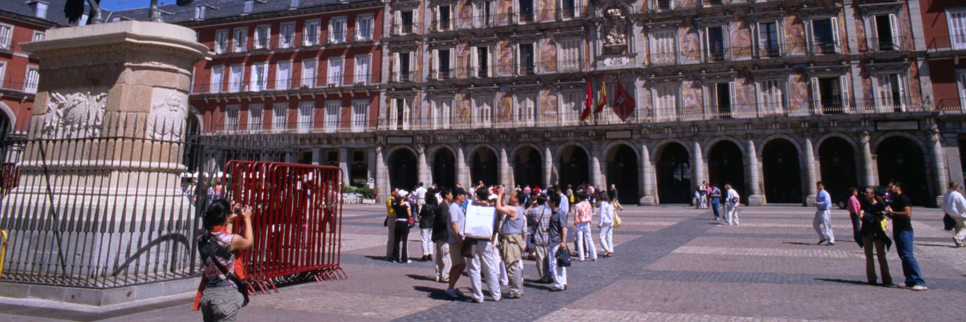 Statue of Felipe III and Real Casa de la Panaderia house on Plaza Mayor, Sol.