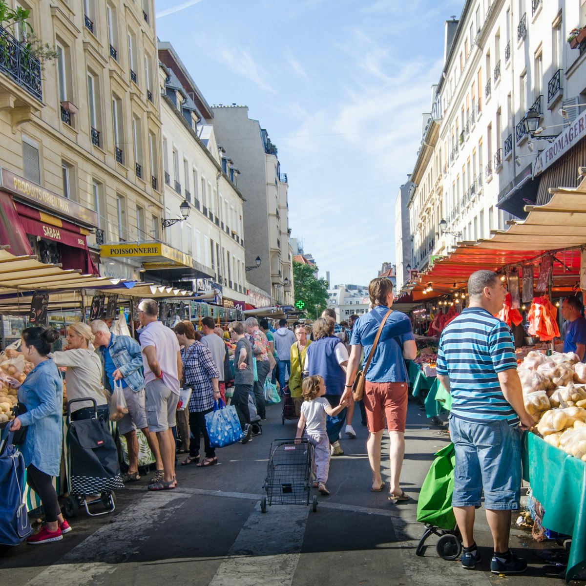 PARIS, FRANCE - AUGUST 29, 2015: The open-air market in the Bastille district is one of the largest and busiest in the city selling fresh produce from France and other European countries. ; Shutterstock ID 318453461; Your name (First / Last): redownload; GL account no.: redownload; Netsuite department name: redownload; Full Product or Project name including edition: redownload