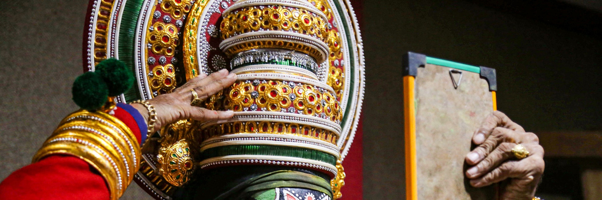 An artist from the Kathakali School Society of Thrissur prepares backstage for his performance in a programme organised by Madhya Pradesh Tribal Museum in Bhopal on June 18, 2018. (Photo by - / AFP)        (Photo credit should read -/AFP/Getty Images)