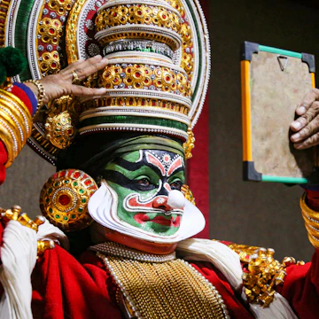 An artist from the Kathakali School Society of Thrissur prepares backstage for his performance in a programme organised by Madhya Pradesh Tribal Museum in Bhopal on June 18, 2018. (Photo by - / AFP) (Photo credit should read -/AFP/Getty Images)