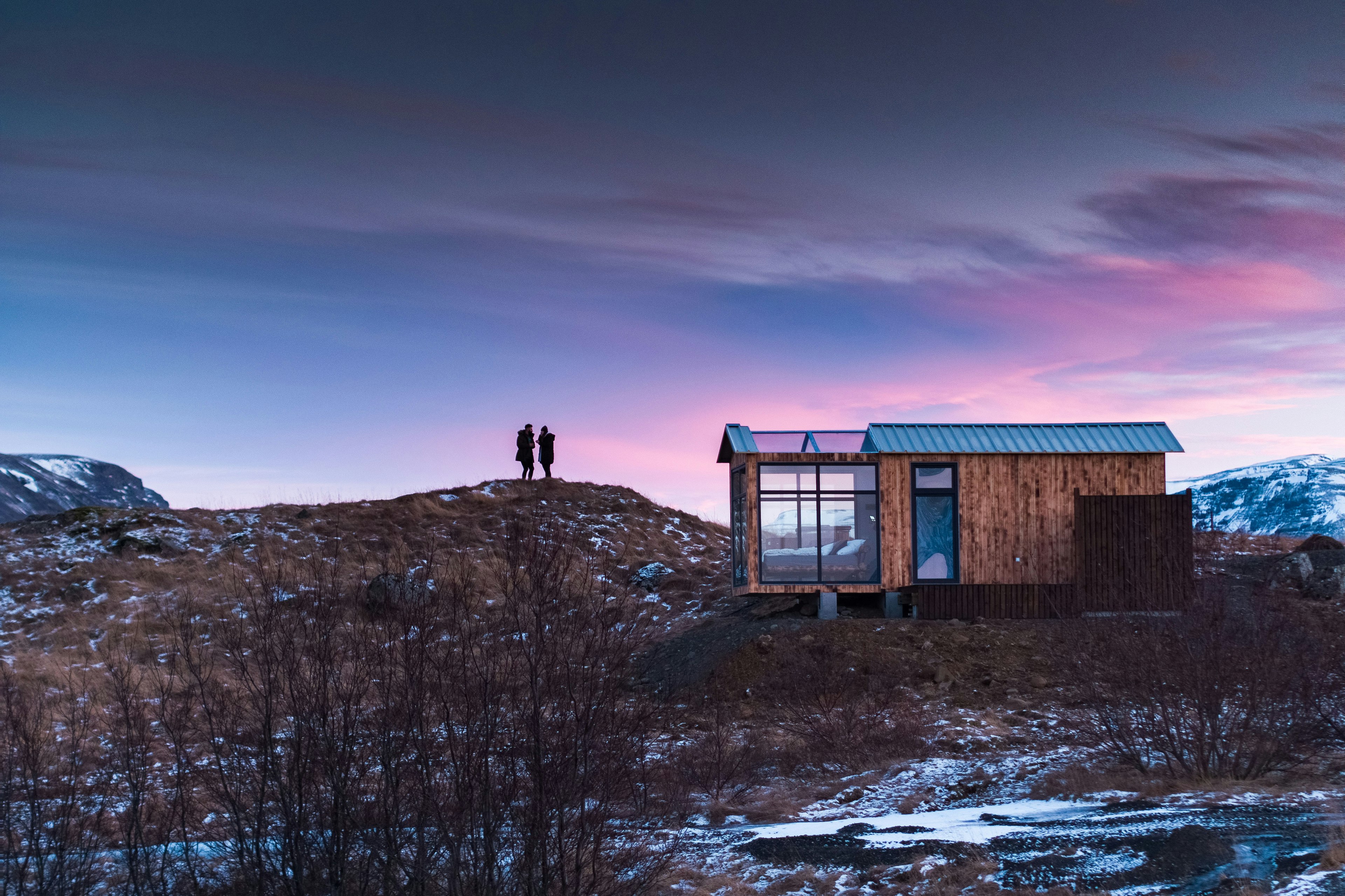 A picture of the Glass Lodge at sunset