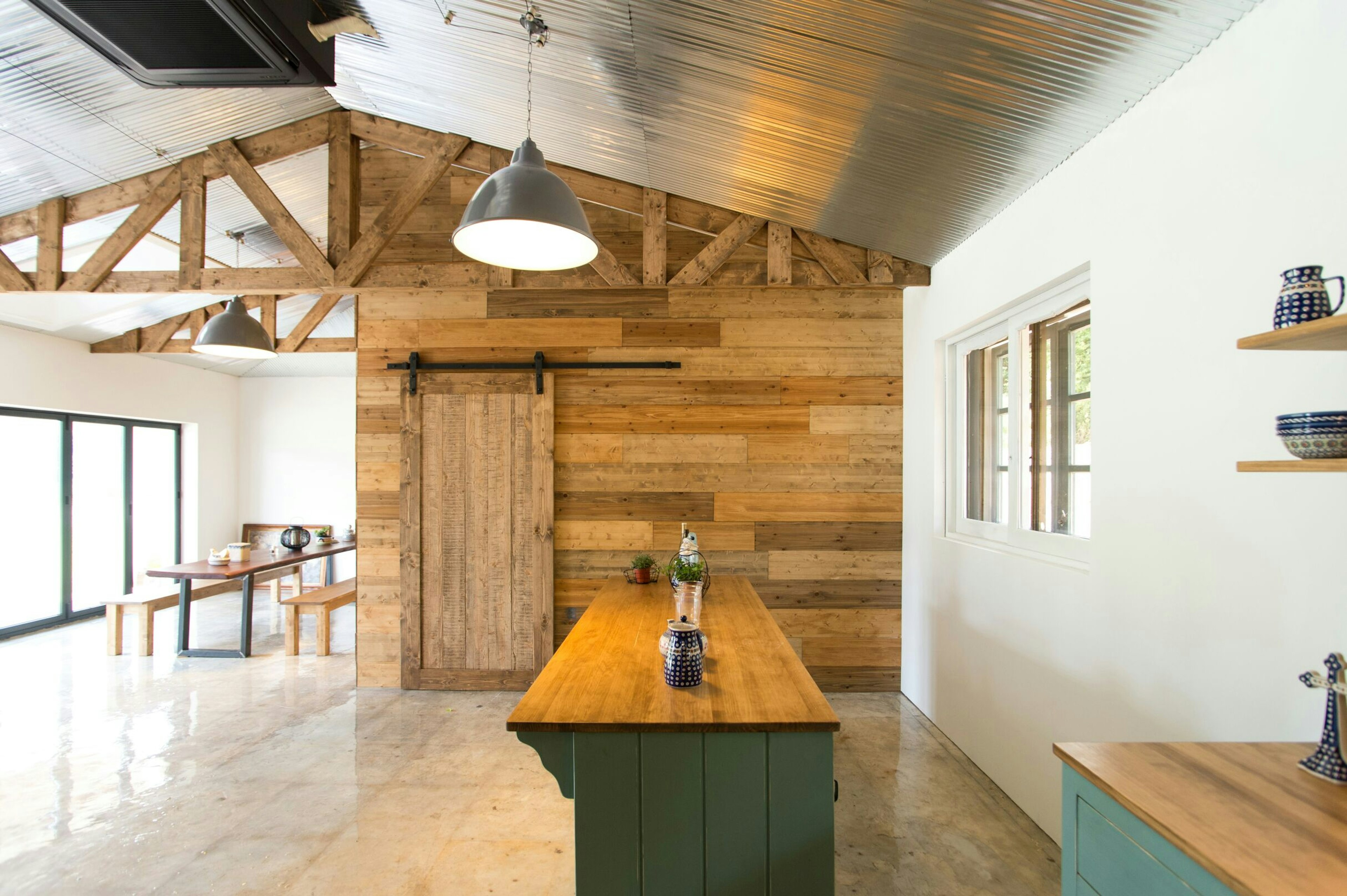 A picture of the house's kitchen with wooden accents and panels