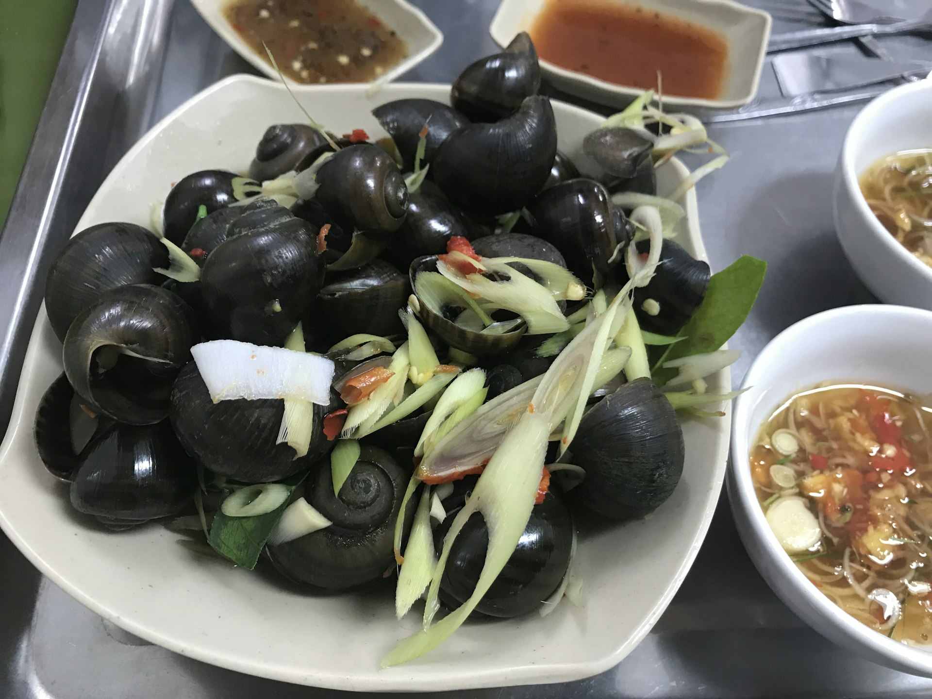 A plate of black sea snails