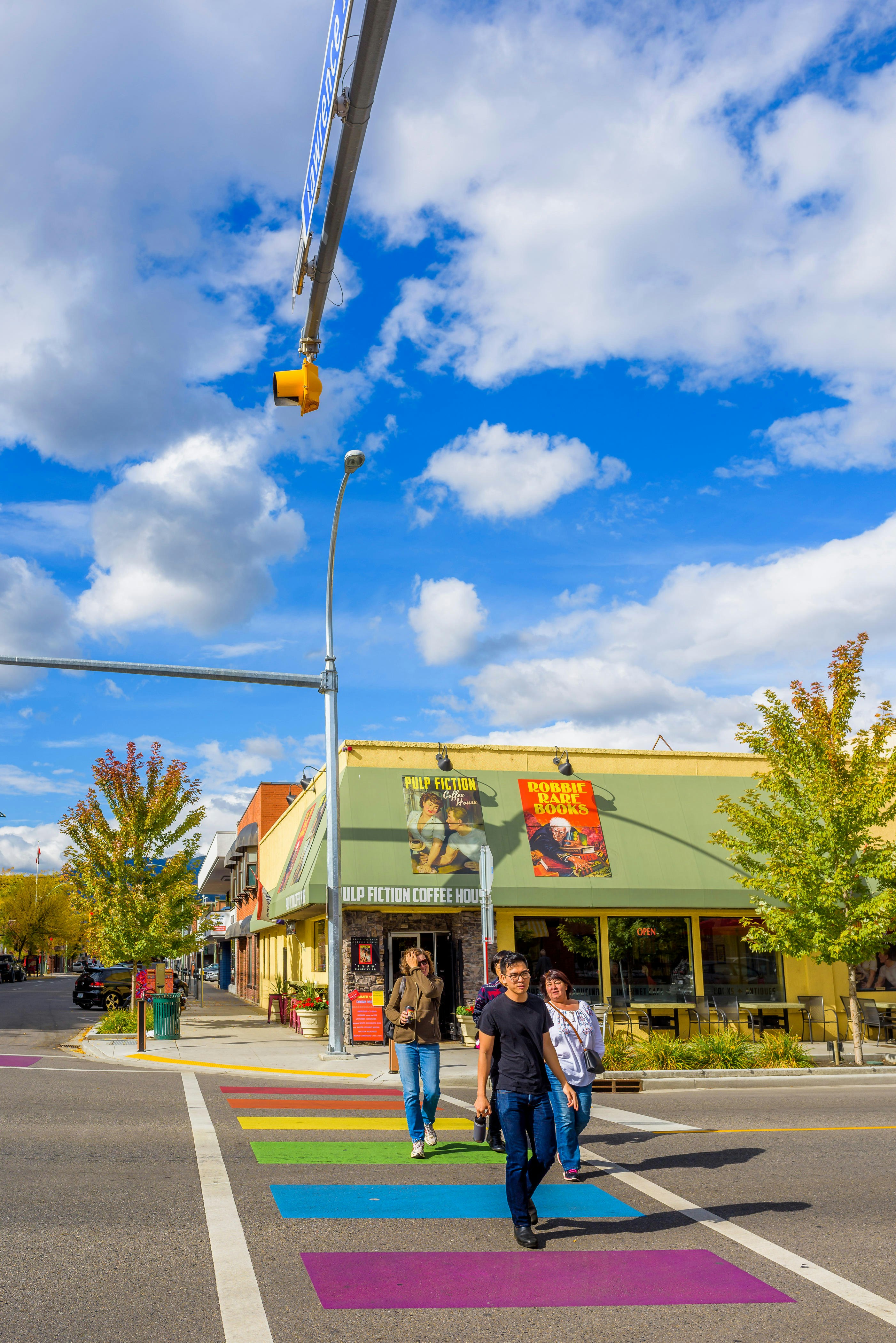 Pulp Fiction Coffee House and bookstore with a rainbow crosswalk in front of it