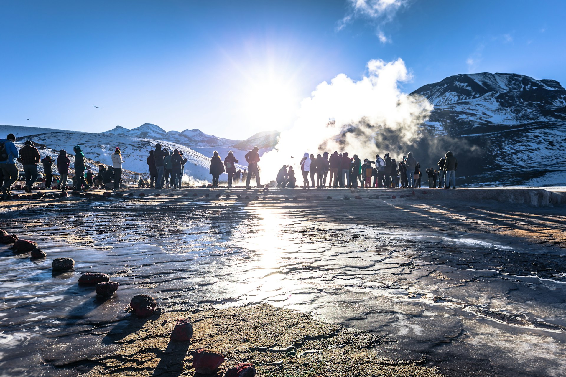 People surround the El Tatio geysers in the Atacama Desert
