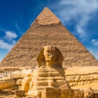 Great Sphinx of Giza with the Great Pyramid of Giza.
