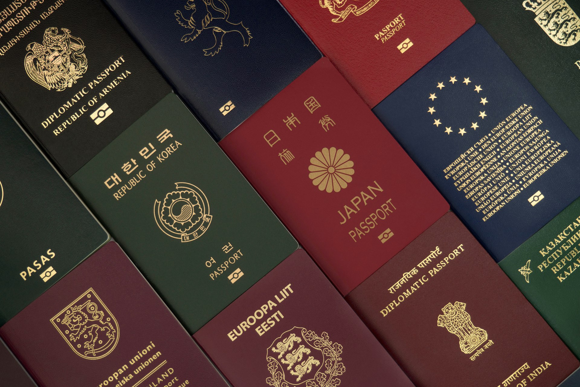 Different foreign passports from many countries as a colourful background