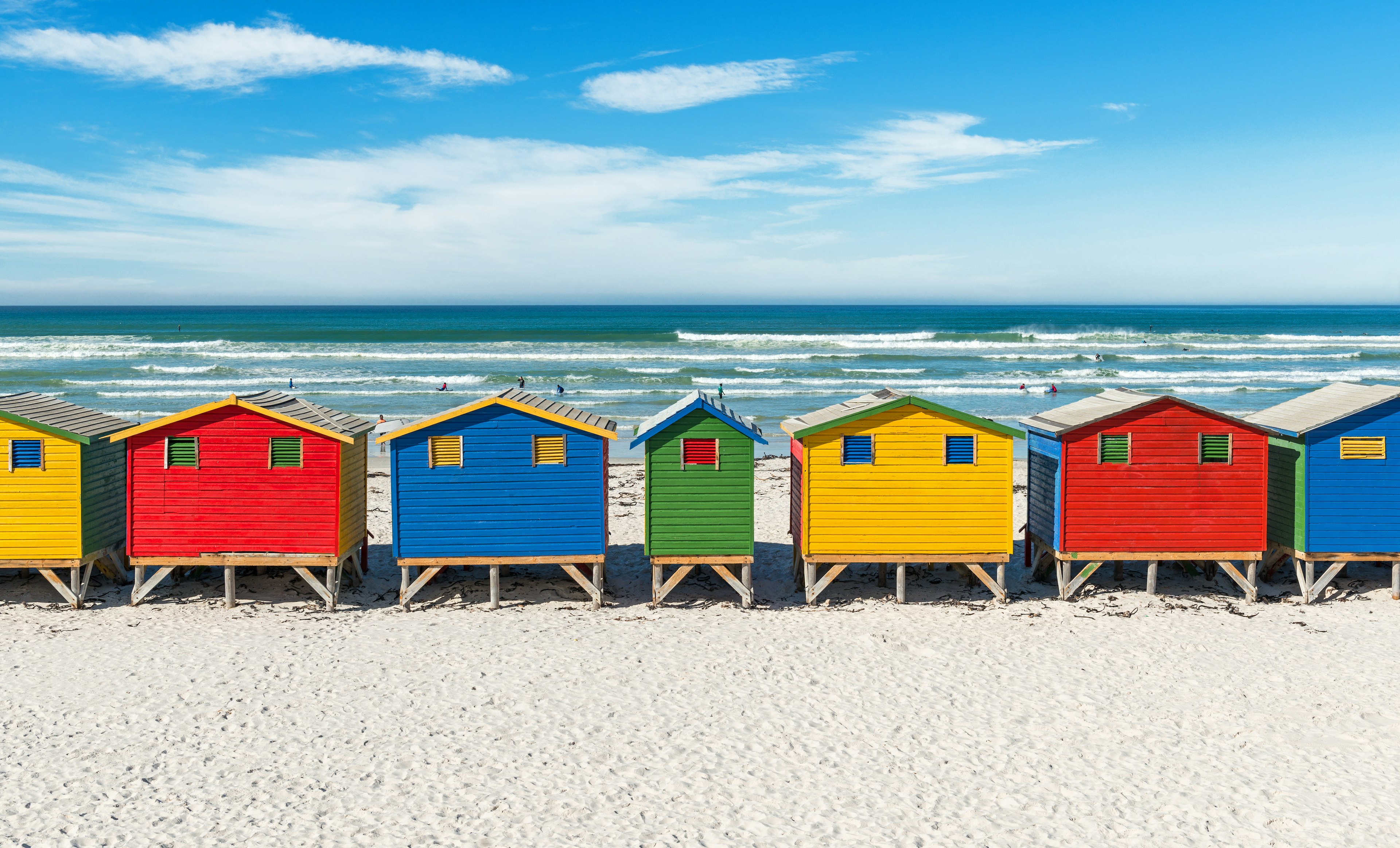 The famous beach of Muizenberg (also known as surfers paradise), with its colorful beach boxes.