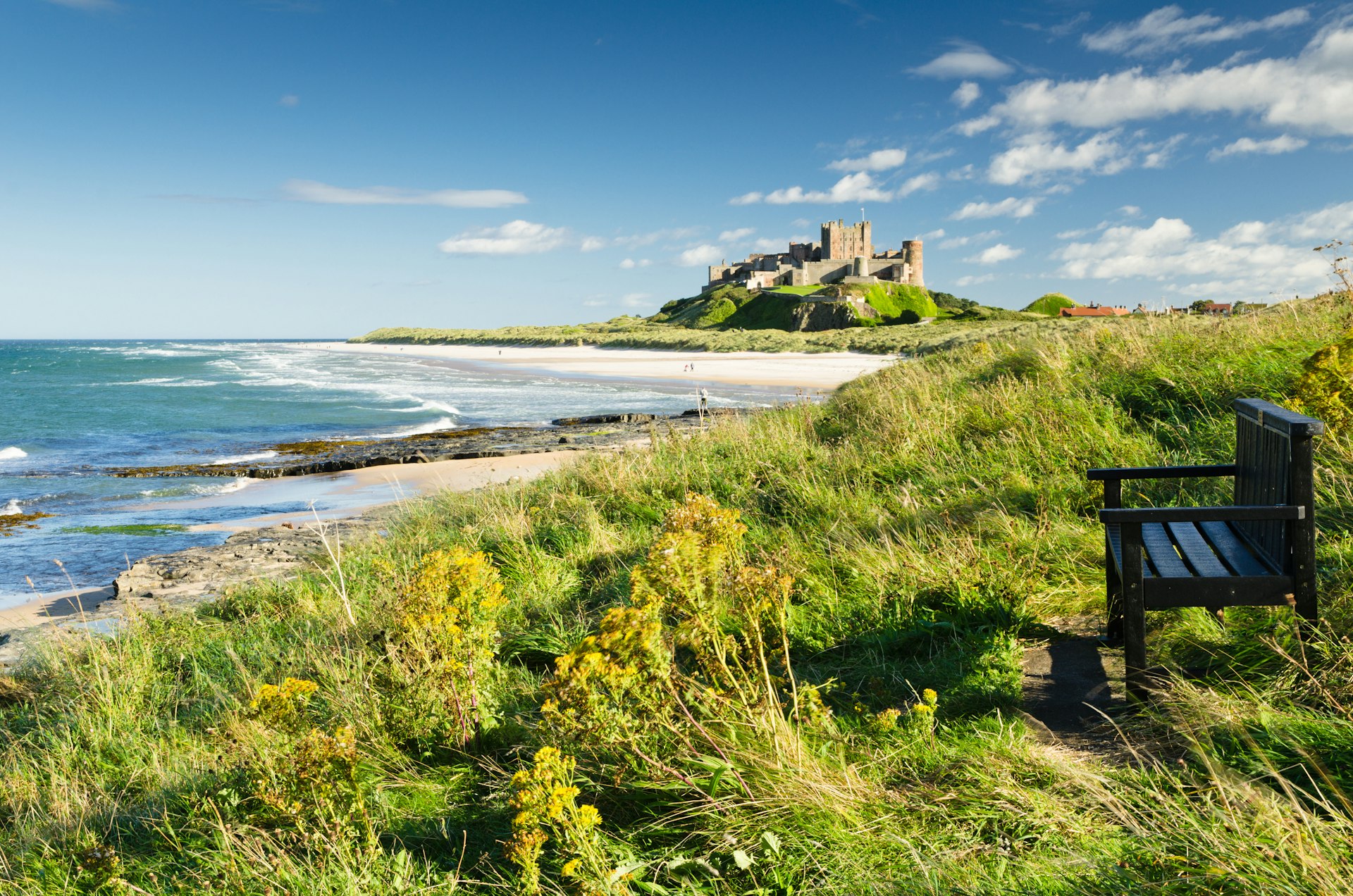 Bamburgh Castle and a rest seat overlooking the sea