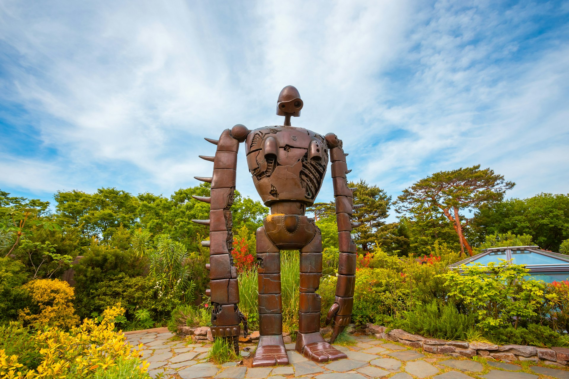 The Robot statue in an open garden space at the Ghibli museum