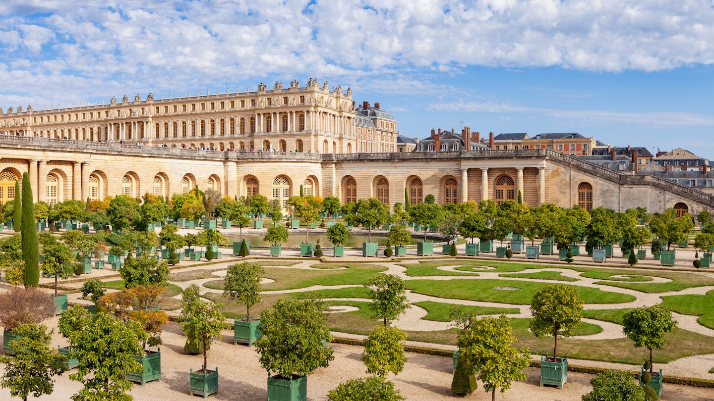 October 11, 2018: Exterior of the Palace of Versailles and the Orangerie in the gardens of Versailles.