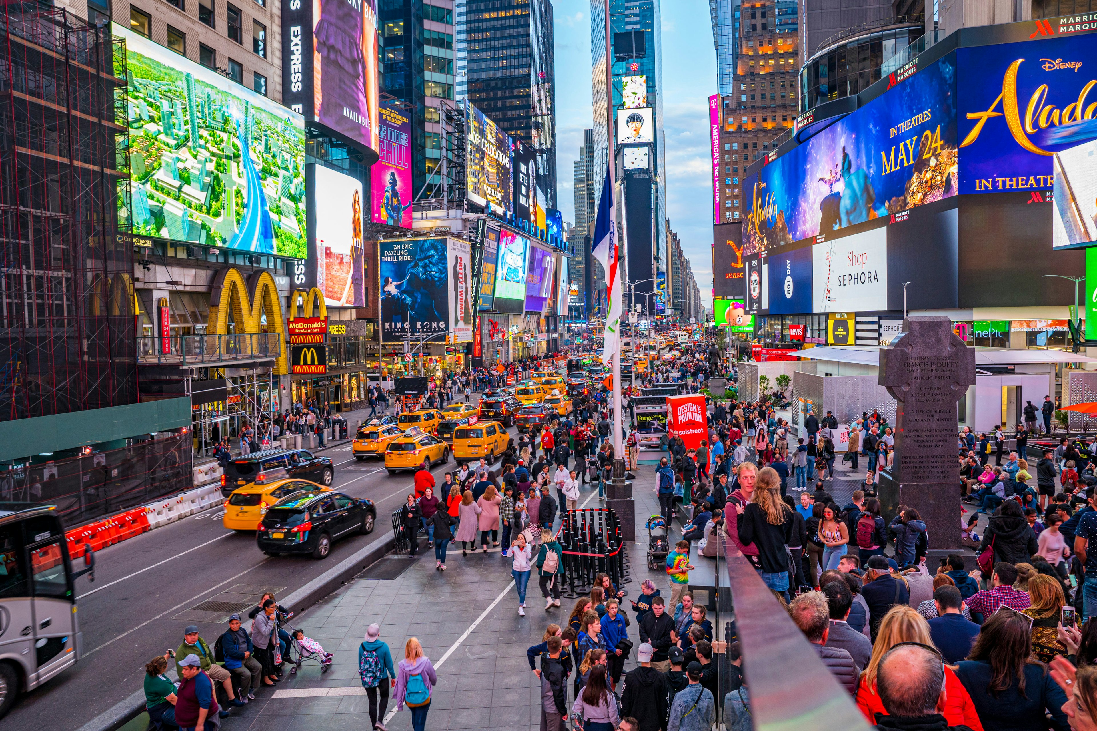 May 10, 2019: Time Square crowded in the early evening with pedestrians and traffic.