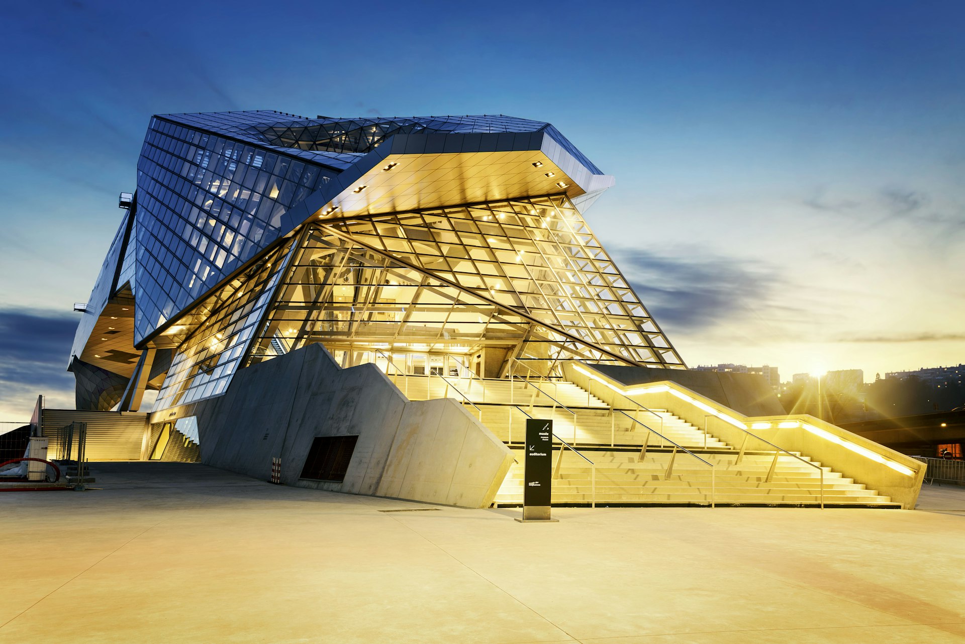An exterior shot of the glass-and-steel Musee des Confluences in Lyon