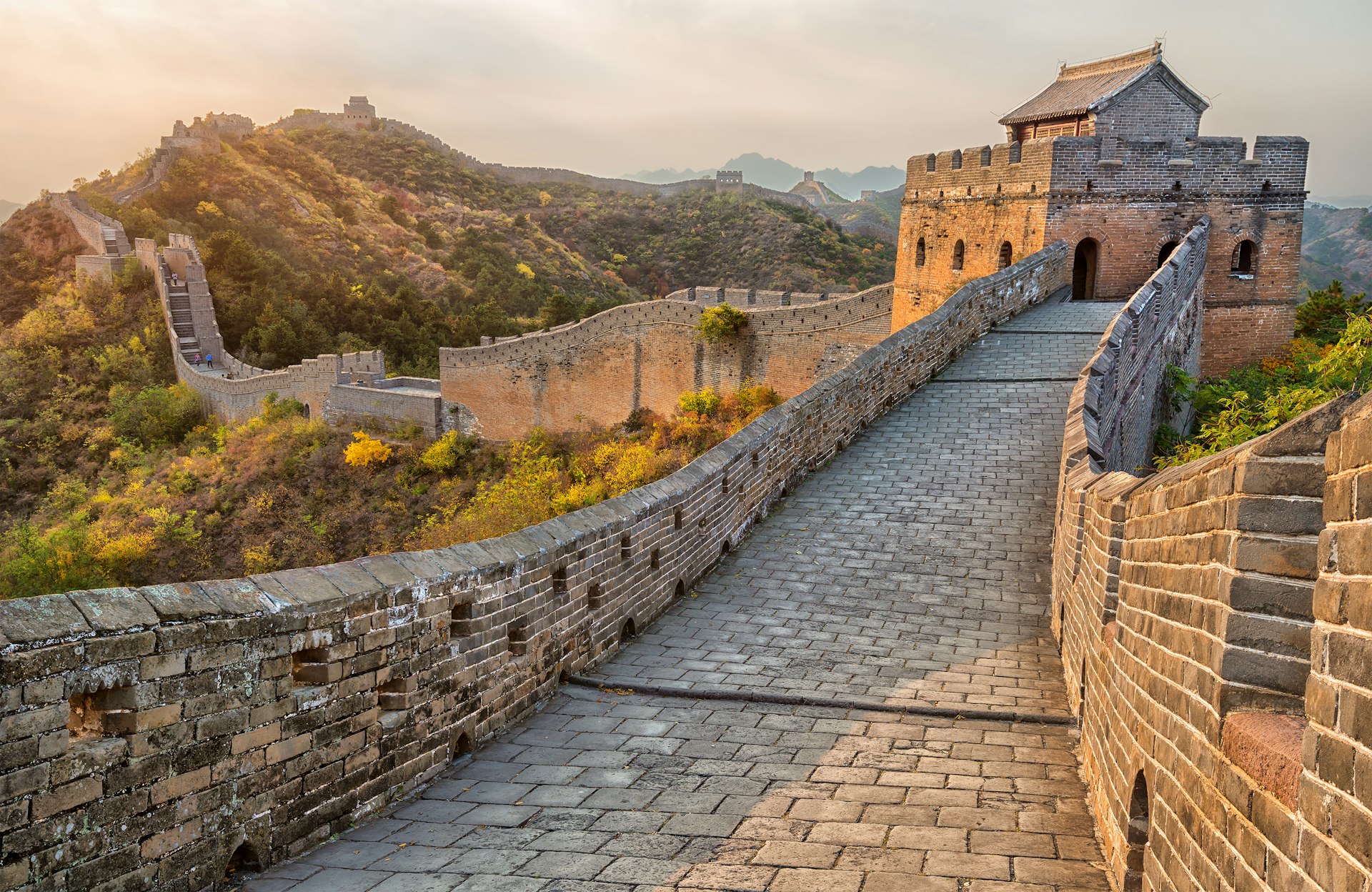 Great Wall of China in autumn during sunset.