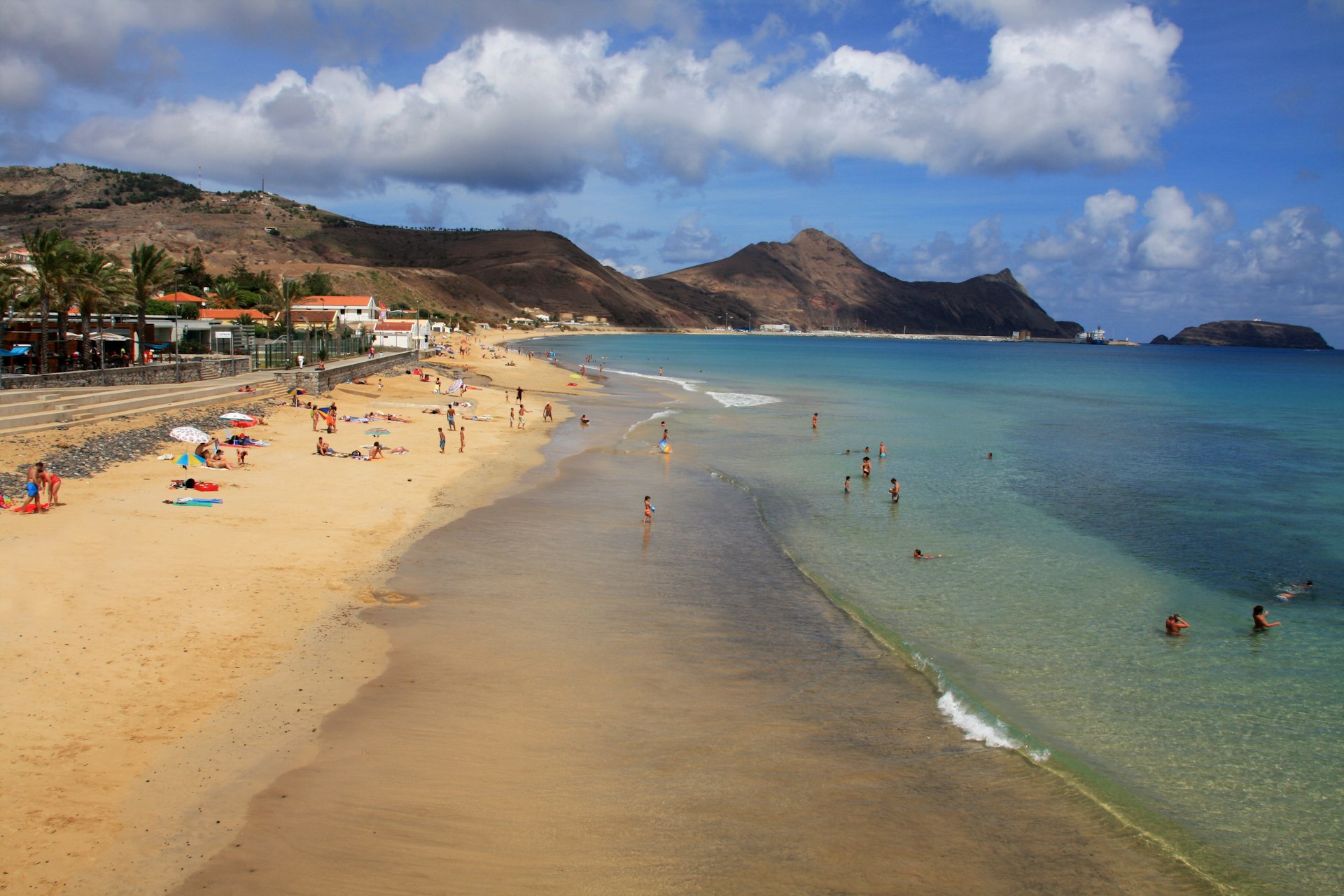 People on Porto Santo beach in the Madeira Islands