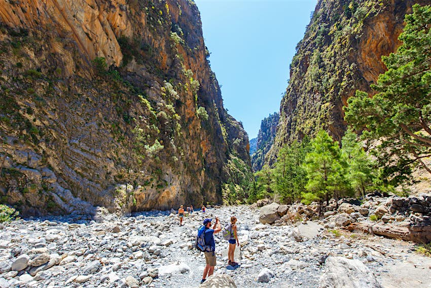 Tourists hike through Samaria Gorge in central Crete