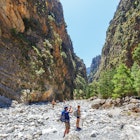 MAY 26, 2016: Tourists hike through Samaria Gorge in central Crete.