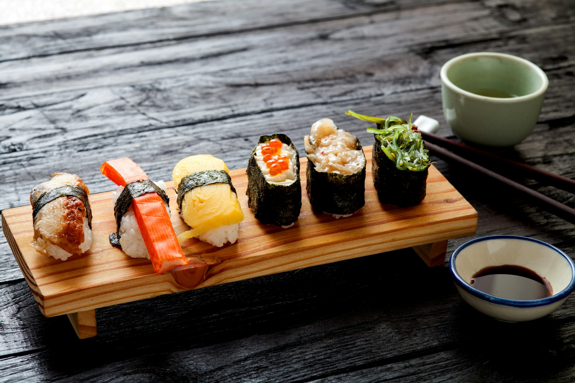 Sushi Set served on dark wooden table