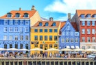 COPENHAGEN, DENMARK - JULY 3, 2016: Nyhavn a 17th century harbour in Copenhagen with typical colorful houses and water canals, Nyhavn, Copenhagen, Denmark