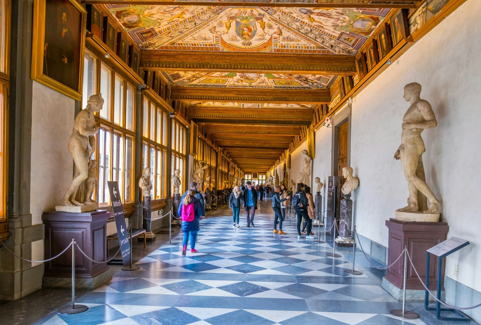 A longshot of the main corridor inside Florence's Uffizi Museum