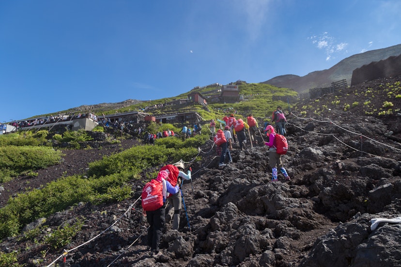MOUNT FUJI, YAMANASHI, JAPAN - JULY 17, 2016 : Crowds of climbers are climbing to the summit of Mount Fuji in Chubu region, Honshu, Japan.