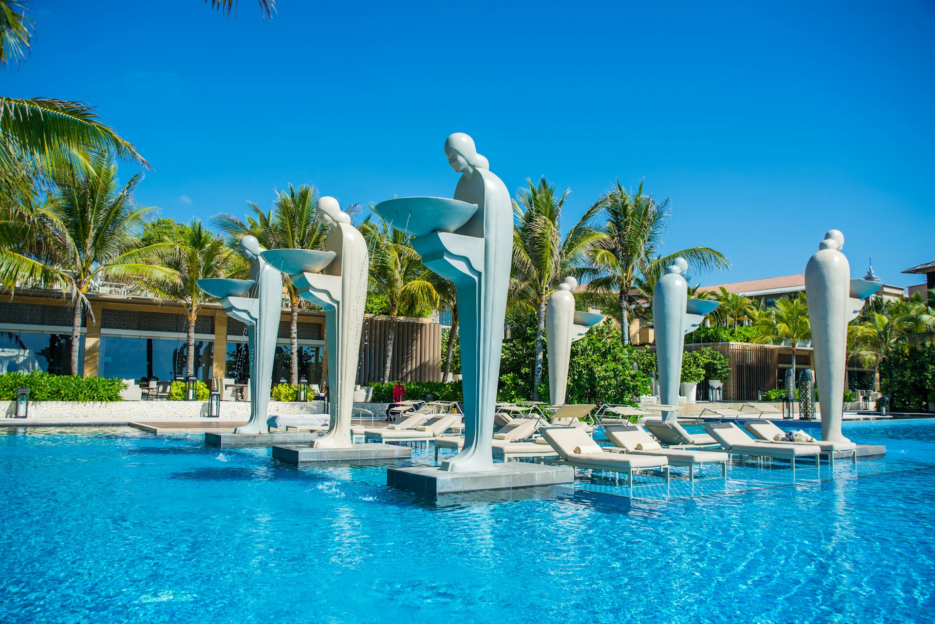 Pool sculptures at luxury Mulia Resort hotel