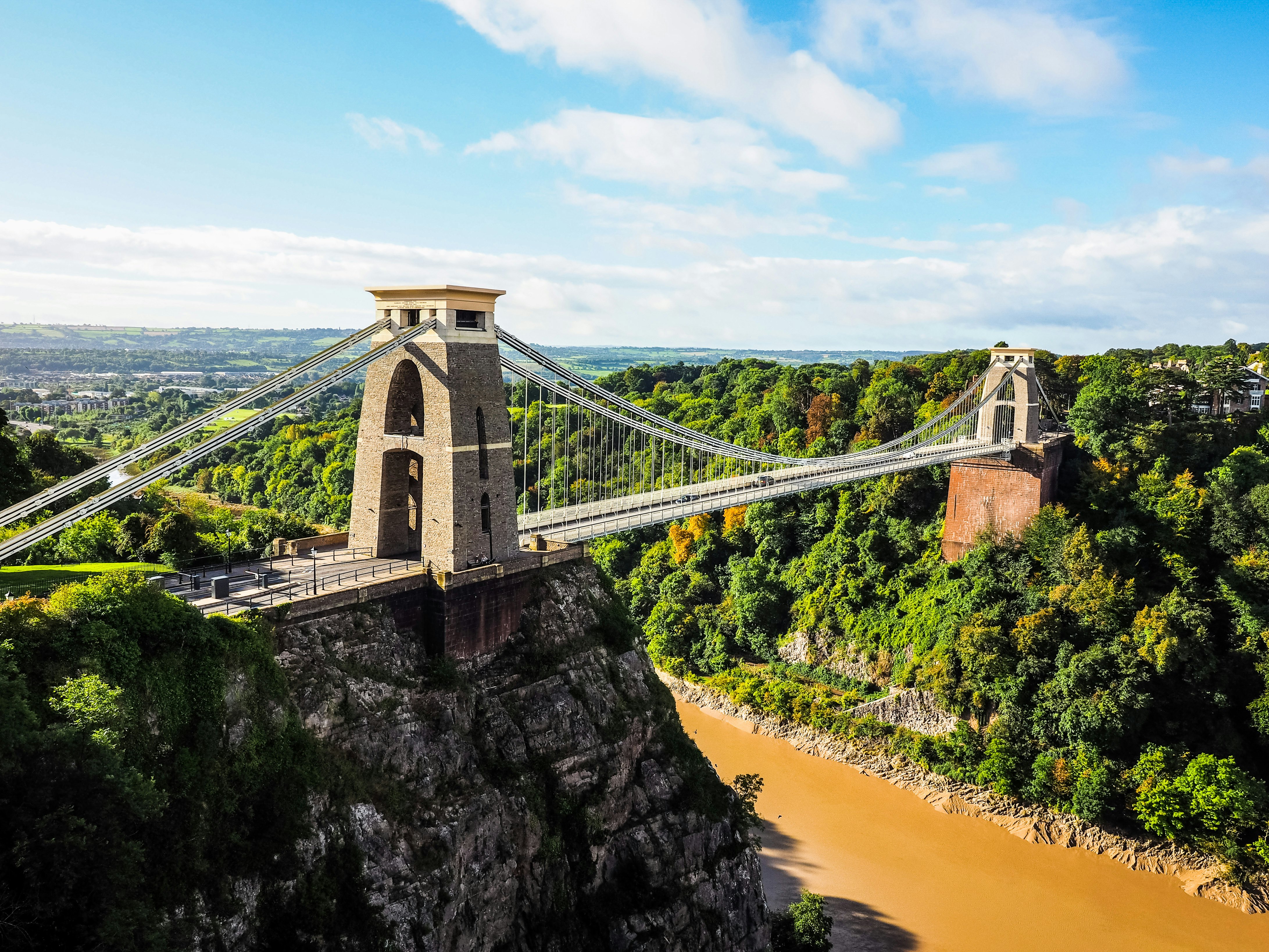 An aerial view of the Victorian-era Clifton Suspension Bridge, which spans the Avon River in Bristol