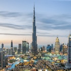 DUBAI, UAE - February 18: Burj Khalifa the tallest building in the world. Dubai Downtown cityscape. Dubai evening skyline, busy roads, sunset on February 18, 2017 in Dubai.