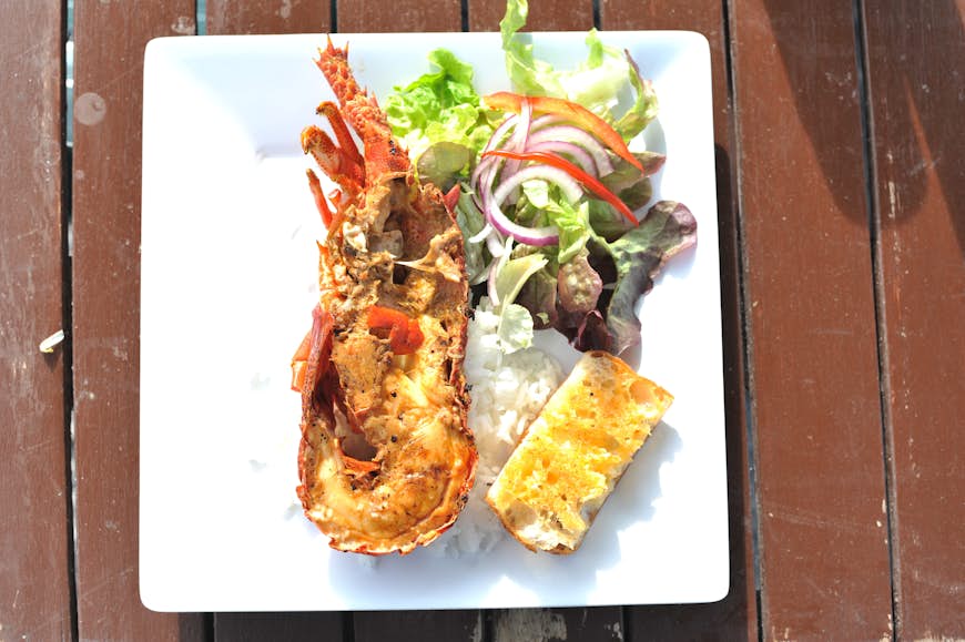 Grilled crayfish with rice and bread served at Kaikoura
