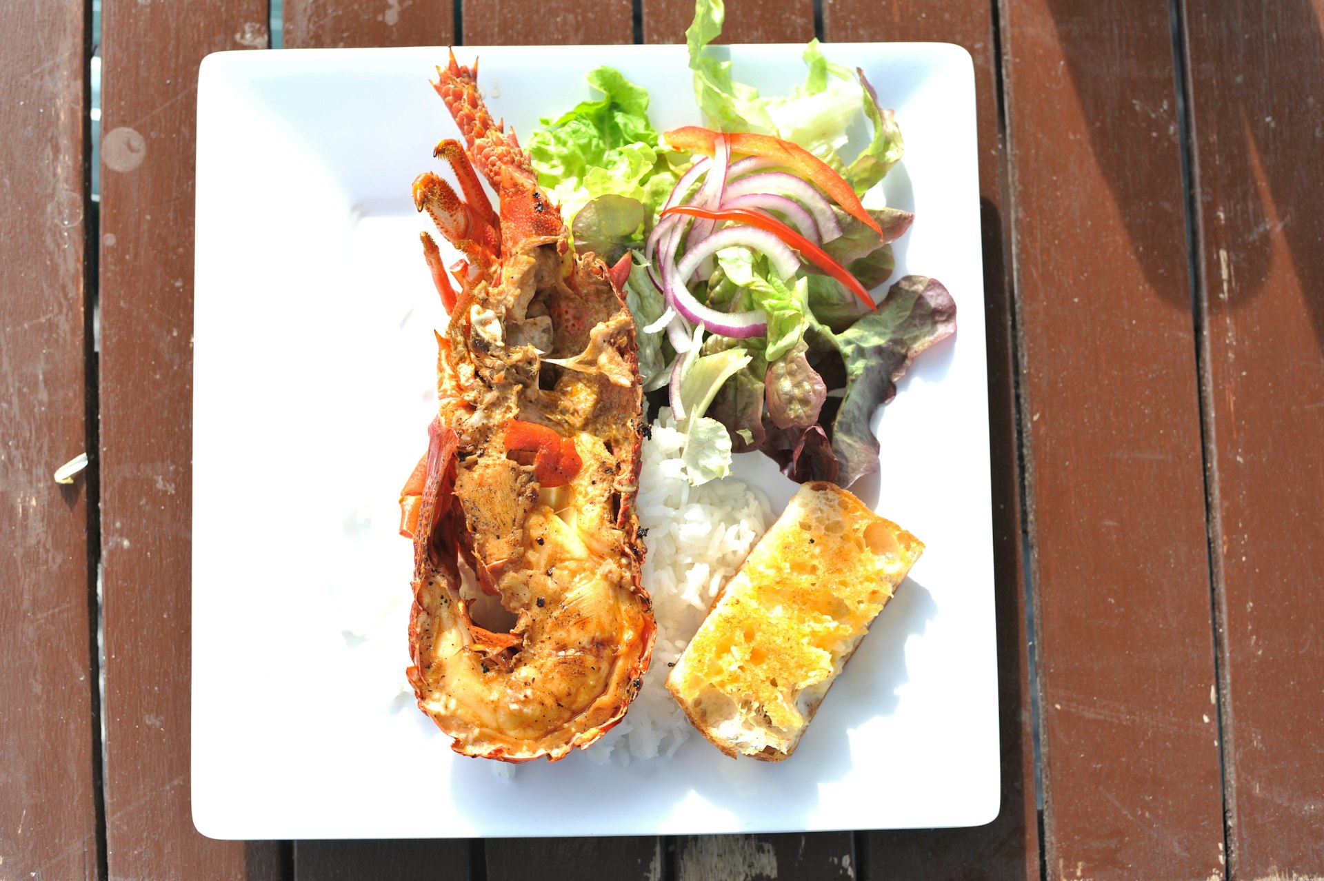 Grilled crayfish with rice and bread served at Kaikoura