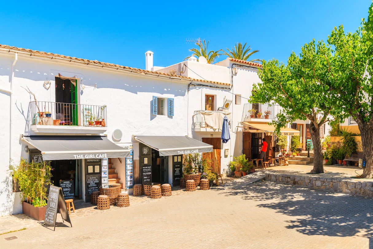 MAY 19, 2017: Traditional white houses and shops in Sant Joan de Labritja village.