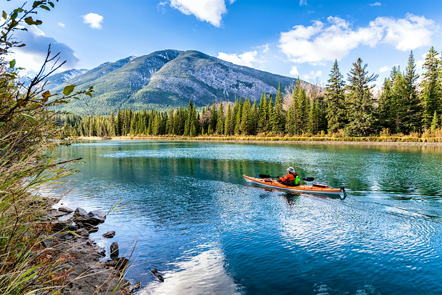 Kayaker on the Bow River near Banff, Canada