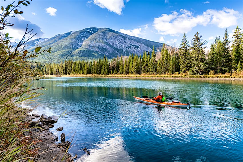 Kayaker on the Bow river near Banff